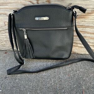 Crossbody Black Purse Nicola Hiller New York. Medium with Adjustable straps.